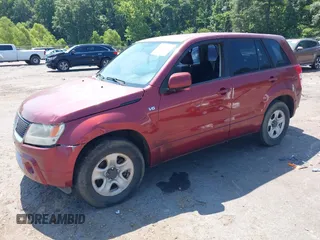 2008 Suzuki Grand Vitara with VIN JS3TE941784102150, listed as a IAAI auction lot 42648115 with 112,959 mi miles and . Bid and sale history available at DreamBid. Image 2.