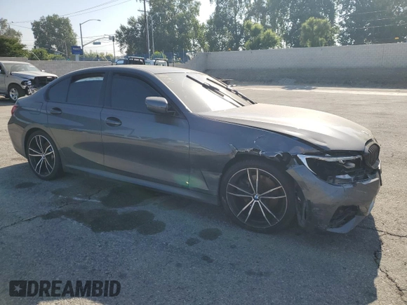 2020 BMW 3 Series 330i z VIN 3MW5R1J00L8B13518, wystawiony jako Copart lot #56289265 z przebiegiem 74 336 mil mil oraz Czysty tytuł • Clean title. Historia ofert i sprzedaży dostępna na DreamBid. Obrazek 4.