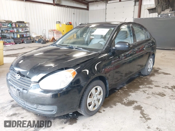 2011 Hyundai Accent GLS z VIN KMHCN4AC1BU620314, wystawiony jako IAAI lot #42228847 z przebiegiem 144 313 mil mil oraz . Historia ofert i sprzedaży dostępna na DreamBid. Obrazek 2.
