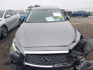 2019 Infiniti Q50 Luxe z VIN JN1EV7AP5KM518681, wystawiony jako IAAI lot #41958746 z przebiegiem 66 629 mil mil oraz . Historia ofert i sprzedaży dostępna na DreamBid. Obrazek 12.