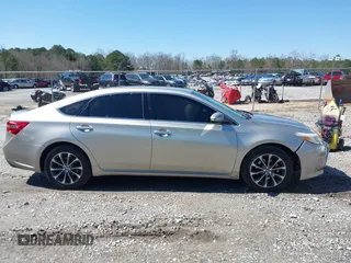 2018 Toyota Avalon XLE with VIN 4T1BK1EB9JU283488, listed as a IAAI auction lot 41777239 with 97,893 mi miles and . Bid and sale history available at DreamBid. Image 13.