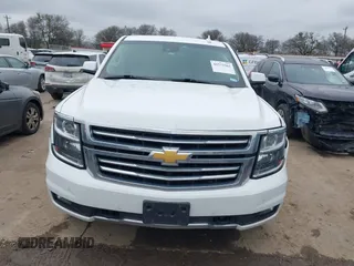 2017 Chevrolet Tahoe LT with VIN 1GNSKBKC1HR401044, listed as a IAAI auction lot 41573362 with 103,865 mi miles and . Bid and sale history available at DreamBid. Image 12.