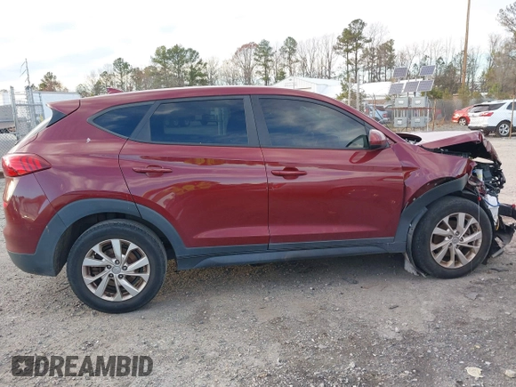 2019 Hyundai Tucson SE with VIN KM8J2CA49KU881841, listed as a IAAI auction lot 41099575 with 129,153 mi miles. Bid and sale history available at carsss.com. Image 13.