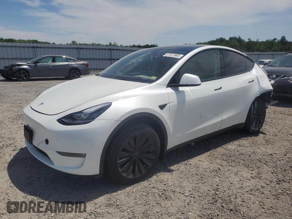 2022 Tesla Model Y Long Range z VIN 7SAYGDEE9NF455614, wystawiony jako Copart lot #57612985 z przebiegiem 22 101 mil mil oraz Szkoda całkowita • Salvage title. Historia ofert i sprzedaży dostępna na DreamBid. Obrazek 1.
