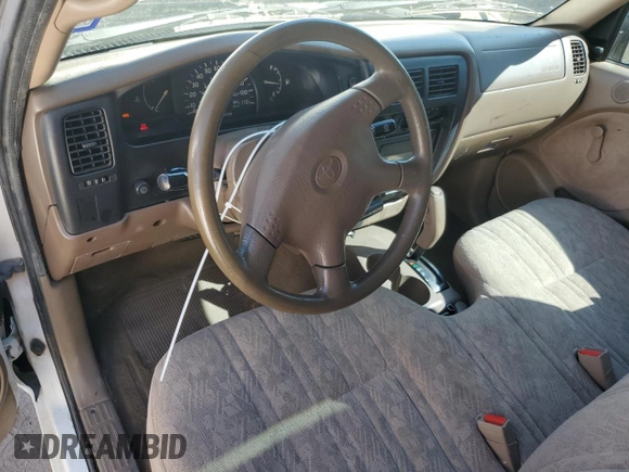 2003 Toyota Tacoma z VIN 5TENL42N53Z256698, wystawiony jako Copart lot #59738915 z przebiegiem 209 801 mil mil oraz Czysty tytuł • Clean title. Historia ofert i sprzedaży dostępna na DreamBid. Obrazek 8.