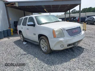 2011 GMC Yukon SLT with VIN 1GKS1CE0XBR156954, listed as a IAAI auction lot 42096120 with 288,142 mi miles. Bid and sale history available at carsss.com. Image 1.