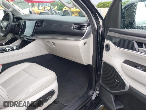 2023 Jeep Wagoneer Series II with VIN 1C4SJRBP4PS562826, listed as a IAAI auction lot 42600245 with 62,557 mi miles and . Bid and sale history available at DreamBid. Image 5.