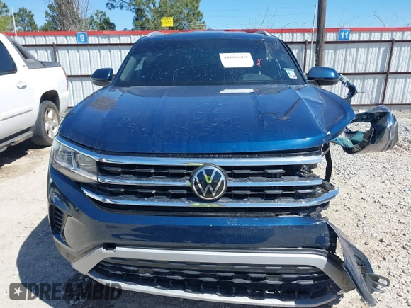 2022 Volkswagen Atlas SE z VIN 1V2WC2CA0NC201743, wystawiony jako IAAI lot #41806601 z przebiegiem Nie podano mil oraz . Historia ofert i sprzedaży dostępna na DreamBid. Obrazek 13.