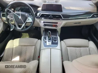 2019 BMW 7 Series 750i with VIN WBA7F0C53KGM24364, listed as a Copart auction lot 53947725 with 71,022 mi miles and Salvage Title. Bid and sale history available at carsss.com. Image 8.