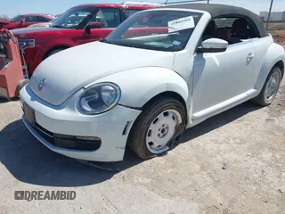 2015 Volkswagen Beetle 1.8T w/Tech with VIN 3VW517AT9FM810122, listed as a IAAI auction lot 41815980 with 72,420 mi miles and . Bid and sale history available at DreamBid. Image 6.