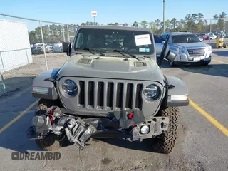 2020 Jeep Wrangler Unlimited Rubicon with VIN 1C4HJXFN4LW136516, listed as a IAAI auction lot 41874403 with 87,576 mi miles. Bid and sale history available at carsss.com. Image 12.