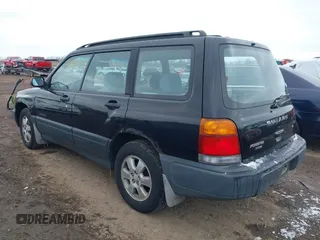 1999 Subaru Forester L with VIN JF1SF6351XH702931, listed as a IAAI auction lot 41612373 with 149,171 mi miles. Bid and sale history available at carsss.com. Image 3.