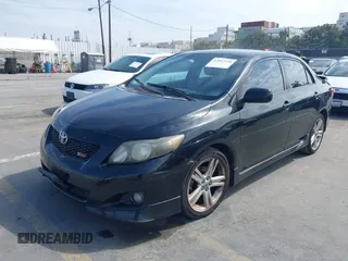 2009 Toyota Corolla XRS with VIN 1NXBE40EX9Z100623, listed as a IAAI auction lot 42032138 with 183,901 mi miles. Bid and sale history available at carsss.com. Image 2.