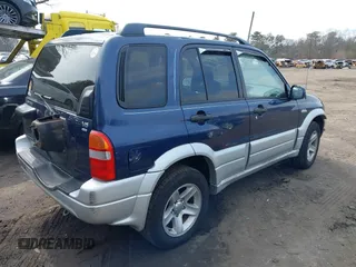 2003 Suzuki Grand Vitara z VIN JS3TD62V534105807, wystawiony jako IAAI lot #41662214 z przebiegiem 111 087 mil mil oraz . Historia ofert i sprzedaży dostępna na DreamBid. Obrazek 4.