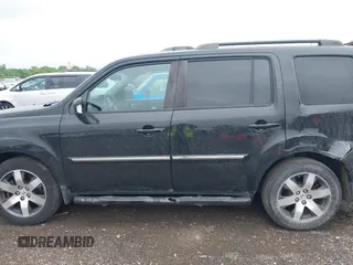 2012 Honda Pilot Touring z VIN 5FNYF4H92CB074778, wystawiony jako IAAI lot #42267913 z przebiegiem 138 362 mil mil oraz . Historia ofert i sprzedaży dostępna na DreamBid. Obrazek 14.