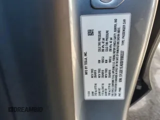 2025 Tesla Model 3 Long Range with VIN 5YJ3E1EA8SF890337, listed as a Copart auction lot 45023425 with 1,765 mi miles and Salvage Title. Bid and sale history available at DreamBid. Image 15.
