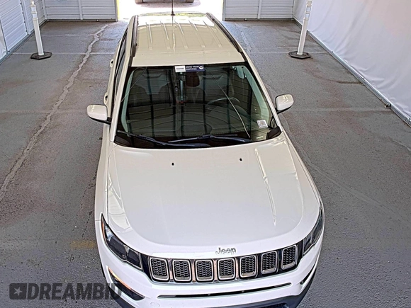 2019 Jeep Compass Latitude z VIN 3C4NJDBB1KT639096, wystawiony jako IAAI lot #42597978 z przebiegiem 110 803 mil mil oraz . Historia ofert i sprzedaży dostępna na DreamBid. Obrazek 7.