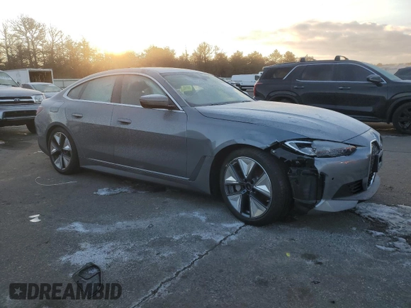 2024 BMW i4 xDrive40 z VIN WBY83FB05RFS82087, wystawiony jako Copart lot #41831225 z przebiegiem 1 396 mil mil oraz Szkoda całkowita • Salvage title. Historia ofert i sprzedaży dostępna na DreamBid. Obrazek 4.