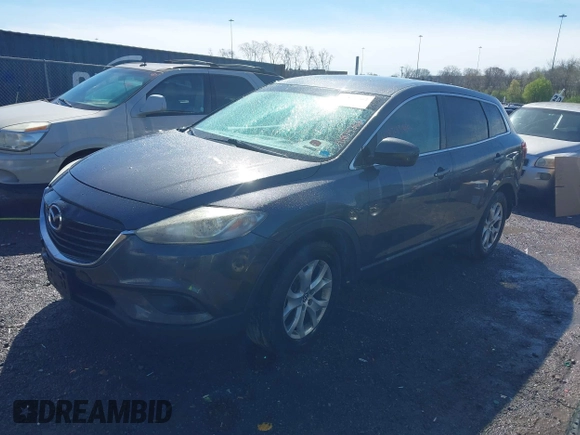 2013 Mazda CX-9 Sport with VIN JM3TB2BA3D0416842, listed as a IAAI auction lot 41874362 with 236,772 mi miles and . Bid and sale history available at carsss.com. Image 2.