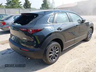 2021 Mazda CX-30 S with VIN 3MVDMBAL6MM264948, listed as a IAAI auction lot 42263077 with 13,614 mi miles and . Bid and sale history available at DreamBid. Image 4.