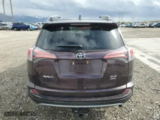 2018 Toyota RAV4 XLE with VIN 2T3RFREV3JW778241, listed as a Copart auction lot 51157395 with 74,317 mi miles and Salvage Title. Bid and sale history available at carsss.com. Image 6.