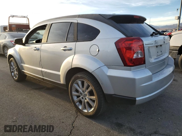 2011 Dodge Caliber Heat with VIN 1B3CB5HA7BD141422, listed as a Copart auction lot 42651095 with 148,995 mi miles and Salvage Title. Bid and sale history available at DreamBid. Image 2.