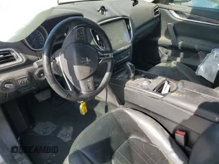2017 Maserati Ghibli z VIN ZAM57XSAXH1248791, wystawiony jako Copart lot #55975084 z przebiegiem 80 926 mil mil oraz Czysty tytuł • Clean title. Historia ofert i sprzedaży dostępna na DreamBid. Obrazek 8.