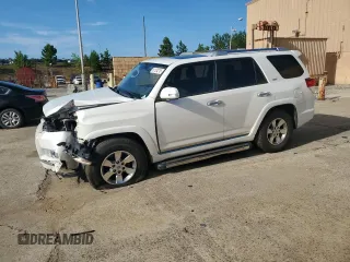 2011 Toyota 4Runner SR5 with VIN JTEZU5JR4B5019951, listed as a Copart auction lot 61124215 with 374,946 mi miles and Salvage title. Bid and sale history available at DreamBid. Image 1.