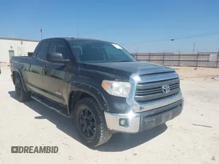2015 Toyota Tundra SR with VIN 5TFRM5F14FX089094, listed as a IAAI auction lot 41827233 with 102,224 mi miles and . Bid and sale history available at DreamBid. Image 1.