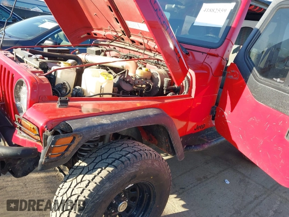 1997 Jeep Wrangler SE z VIN 1J4FY29PXVP476036, wystawiony jako IAAI lot #41882559 z przebiegiem 82 888 mil mil oraz . Historia ofert i sprzedaży dostępna na DreamBid. Obrazek 6.