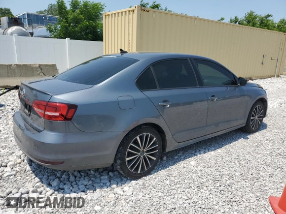 2015 Volkswagen Jetta SE with VIN 3VWD17AJ2FM323094, listed as a Copart auction lot 60304265 with 115,540 mi miles and Salvage title. Bid and sale history available at DreamBid. Image 3.