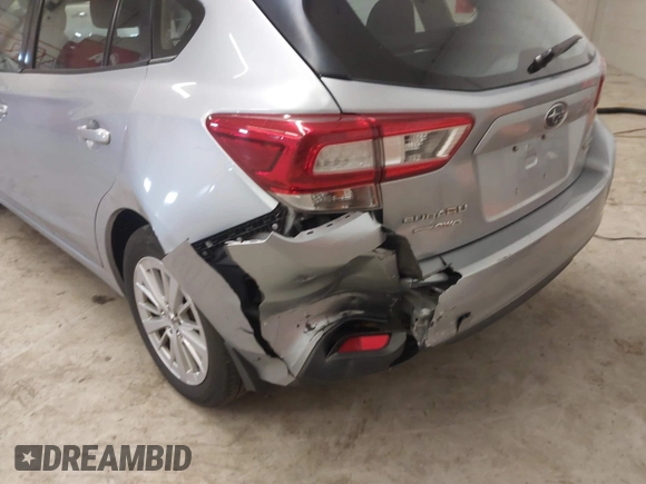 2017 Subaru Impreza Premium z VIN 4S3GTAB63H3705818, wystawiony jako IAAI lot #41568064 z przebiegiem 132 046 mil mil oraz . Historia ofert i sprzedaży dostępna na DreamBid. Obrazek 6.