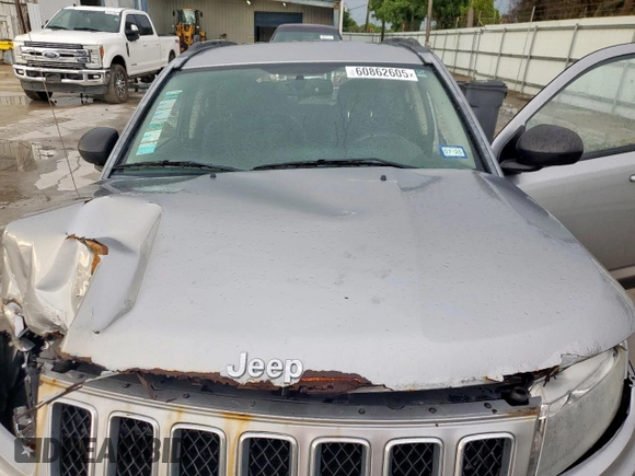 2016 Jeep Compass Sport with VIN 1C4NJCBA8GD559907, listed as a Copart auction lot 60862605 with Not provided miles and Salvage title. Bid and sale history available at DreamBid. Image 11.