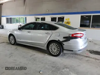 2013 Ford Fusion SE Hybrid with VIN 3FA6P0LU1DR368722, listed as a Copart auction lot 54738695 with 201,326 mi miles and Clean title. Bid and sale history available at DreamBid. Image 2.