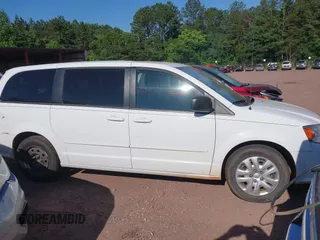 2017 Dodge Grand Caravan SE z VIN 2C4RDGBG0HR624803, wystawiony jako IAAI lot #42323391 z przebiegiem 291 747 mil mil oraz . Historia ofert i sprzedaży dostępna na DreamBid. Obrazek 13.