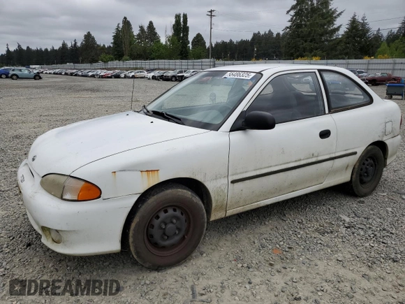 1999 Hyundai Accent with VIN KMHVD14N9XU503210, listed as a Copart auction lot 56486325 with 195,501 mi miles and Salvage title. Bid and sale history available at DreamBid. Image 1.
