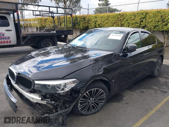 2019 BMW 5 Series 530e with VIN WBAJA9C52KB399480, listed as a IAAI auction lot 41714228 with 90,435 mi miles and . Bid and sale history available at DreamBid. Image 18.