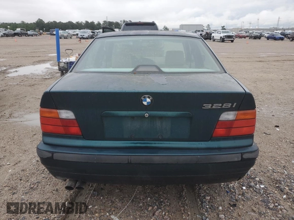 1997 BMW 3 Series 328iA with VIN WBACD4329VAV48468, listed as a Copart auction lot 54053965 with 143,564 mi miles and Clean Title. Bid and sale history available at carsss.com. Image 6.