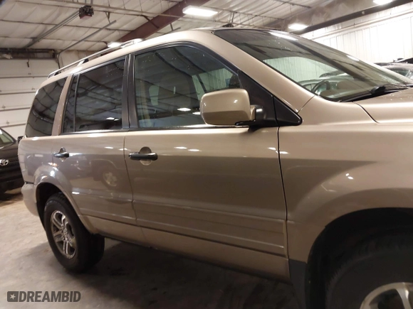2004 Honda Pilot EX with VIN 2HKYF18464H567384, listed as a IAAI auction lot 41790773 with 142,534 mi miles. Bid and sale history available at carsss.com. Image 14.