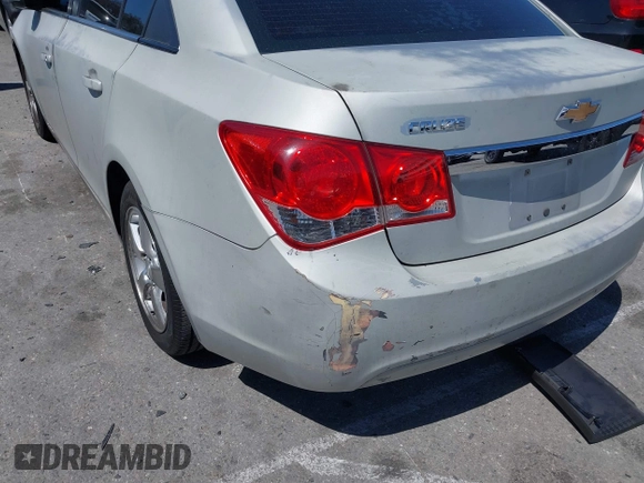 2014 Chevrolet Cruze 1LT with VIN 1G1PC5SB0E7158038, listed as a IAAI auction lot 41946995 with 164,578 mi miles and . Bid and sale history available at DreamBid. Image 6.