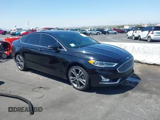 2020 Ford Fusion Titanium with VIN 3FA6P0K90LR153277, listed as a IAAI auction lot 42729550 with 83,267 mi miles and . Bid and sale history available at DreamBid. Image 1.