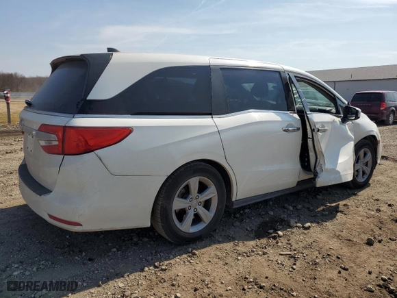 2019 Honda Odyssey EX-L with VIN 5FNRL6H71KB003335, listed as a Copart auction lot 48749535 with 130,415 mi miles and Salvage Title. Bid and sale history available at carsss.com. Image 3.