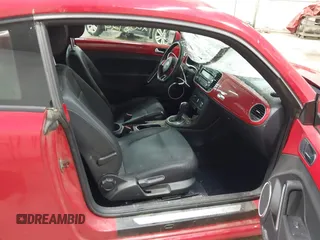 2013 Volkswagen Beetle 2.5L with VIN 3VWJP7AT3DM606135, listed as a IAAI auction lot 42006924 with 78,534 mi miles and . Bid and sale history available at DreamBid. Image 5.