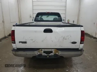 2000 Ford F-150 XL with VIN 1FTRF17L7YNB52822, listed as a Copart auction lot 43421495 with 103,753 mi miles and Salvage title. Bid and sale history available at DreamBid. Image 6.