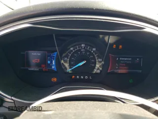 2013 Ford Fusion SE Hybrid z VIN 3FA6P0LUXDR362711, wystawiony jako Copart lot #57060425 z przebiegiem 155 031 mil mil oraz Szkoda całkowita • Salvage title. Historia ofert i sprzedaży dostępna na DreamBid. Obrazek 9.