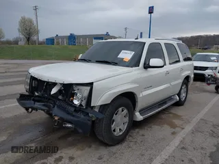 2005 Cadillac Escalade z VIN 1GYEK63N25R190908, wystawiony jako IAAI lot #41882135 z przebiegiem 243 333 mil mil oraz . Historia ofert i sprzedaży dostępna na DreamBid. Obrazek 2.