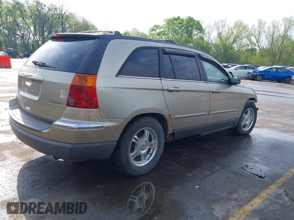 2005 Chrysler Pacifica Touring with VIN 2C8GF68465R252922, listed as a IAAI auction lot 42061282 with 134,543 mi miles and . Bid and sale history available at DreamBid. Image 4.