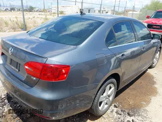 2012 Volkswagen Jetta TDI w/Premium with VIN 3VWLL7AJ1CM307485, listed as a IAAI auction lot 42384300 with 118,958 mi miles and . Bid and sale history available at DreamBid. Image 4.
