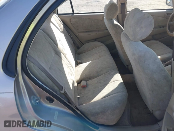 1998 Toyota Corolla VE z VIN 2T1BR18E9WC045442, wystawiony jako IAAI lot #42104201 z przebiegiem 243 256 mil mil oraz . Historia ofert i sprzedaży dostępna na DreamBid. Obrazek 8.
