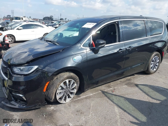 2023 Chrysler Pacifica Hybrid Touring L with VIN 2C4RC1L78PR543402, listed as a IAAI auction lot 41536710 with 35,867 mi miles. Bid and sale history available at carsss.com. Image 2.